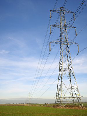 stock-photo-electricity-power-lines-cross-cotswold-farmland-at-cleeve-common-165076136